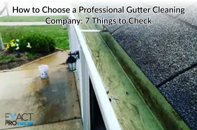 Exact ProWash technician performing professional gutter cleaning by removing debris and flushing downspouts on an Ohio home